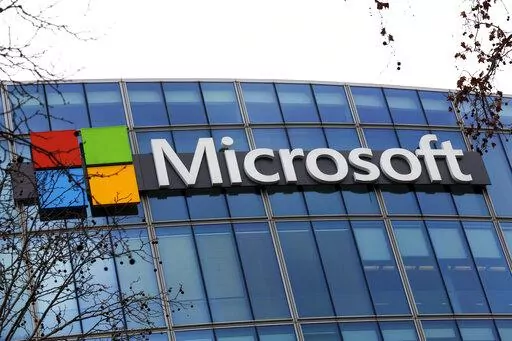 The Microsoft logo is pictured outside the headquarters in Paris, Jan. 8, 2021. A group of video game testers is forming Microsoft's first labor union in the U.S. and the largest in the video game industry. Communications Workers of America said Tuesday, Jan. 3, 2023, that about 300 quality assurance workers at Microsoft video game subsidiary ZeniMax Studios have voted to join the union. (AP Photo/Thibault Camus, File)