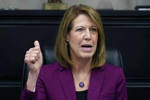 Rep. Cindy Axne, D-Iowa, speaks during a roundtable discussion at the Elite Octane ethanol plant Nov. 9, 2021, in Atlantic, Iowa. Moments after she flipped a longtime Republican congressional seat in 2018, Axne declared that "Washington doesn't have our back and we deserve a heck of a lot better." Now seeking a third term in one of the most competitive House races, Axne is sounding a similar tone, telling voters she's delivered for Iowans "while Washington politicians bicker." (AP Photo/Charlie 