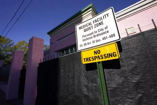 A sign indicating a "Medical Facility Quiet Zone" is displayed outside the Jackson Women's Health Organization clinic in Jackson, Miss., the state's only state licensed abortion facility, Wednesday, Nov. 18, 2020. According to a report from the Guttmacher Institute released on Tuesday, June 15, 2022, fewer women were getting pregnant and a larger share of them chose abortion. About one in five pregnancies ended in abortion in 2020. There were 3.6 million births, a decline between 2017 and 2020. 