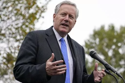White House chief of staff Mark Meadows speaks with reporters outside the White House, Monday, Oct. 26, 2020, in Washington. A federal appeals court will hear arguments Friday, Dec. 15, 2023, over whether the election interference charges filed against Trump White House chief of staff Mark Meadows should be moved from a state court to federal court. (AP Photo/Patrick Semansky, File)