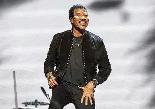 Lionel Richie performs at KAABOO Texas in Arlington, Texas on May 10, 2019. The Library of Congress said Thursday that Richie will receive the national library’s Gershwin Prize for Popular Song. He will be bestowed the prize at an all-star tribute in Washington, D.C., on March 9. (Photo by Amy Harris/Invision/AP, File)