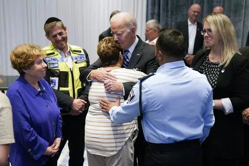 President Joe Biden meets with victims' relatives and first responders who were directly affected by the Hamas attacks, Wednesday, Oct. 18, 2023, in Tel Aviv. (AP Photo/Evan Vucci)