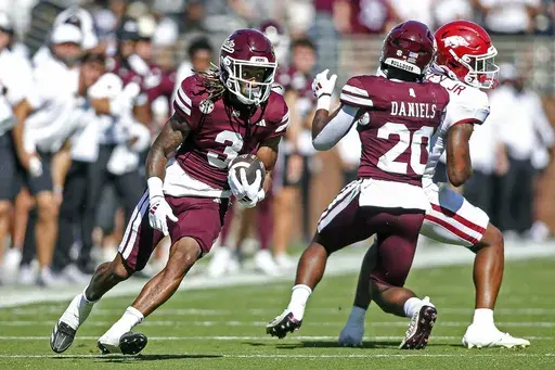 Mississippi State wide receiver Kevin Coleman Jr. (3) runs downfield after a catch against Arkansas during the first half of an NCAA college football game in Starkville, Miss., Saturday, Oct. 26, 2024. (AP Photo/James Pugh)