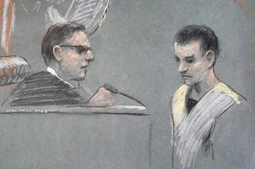 This artist depiction shows Massachusetts Air National Guardsman Jack Teixeira, right, appearing in U.S. District Court in Boston, April 14, 2023. Prosecutors say that superiors of Teixeira, charged with leaking highly classified military documents, had raised concerns internally on multiple occasions about his handling or viewing of classified information. (Margaret Small via AP, File)