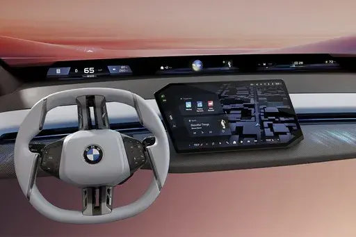 This photo provided by BMW shows the company's new Panoramic iDrive interface. It features a dash-spanning display atop the dash to help drivers better access controls and information with less distraction. (Courtesy of BMW of North America via AP)