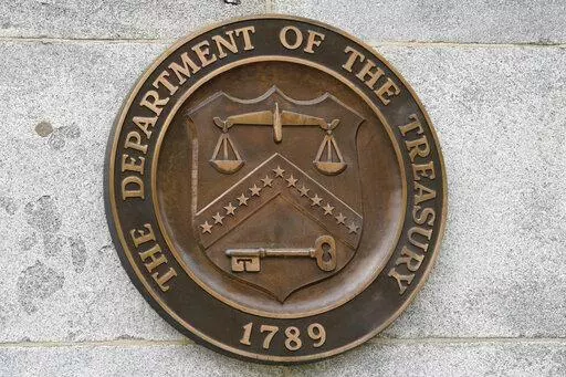 The Department of the Treasury's seal outside the Treasury Department building in Washington on May 4, 2021. The national debt is at the core of a dispute about how to raise the government's legal borrowing authority, which could come to a head this summer if the government runs out of accounting maneuvers to keep paying its bills. (AP Photo/Patrick Semansky, File)