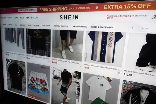 A page from the Shein website is shown in this photo, in New York, Friday, June 23, 2023. Fast fashion retailers Shein and Forever 21 are going into business together. Under a partnership agreement announced Thursday, Aug. 24, 2023 the Chinese-owned Shein will acquire about one-third interest in Sparc Group, Forever 21’s operator. (AP Photo/Richard Drew)