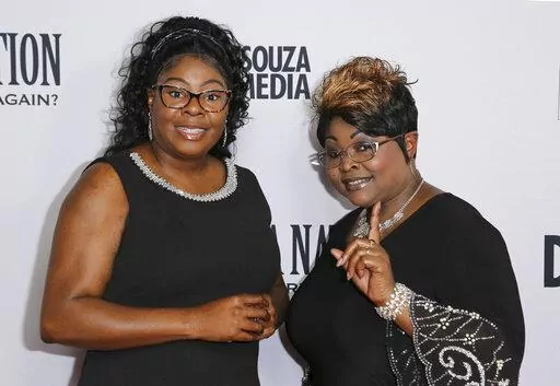 Lynnette Hardaway, left, and Rochelle Richardson, a.k.a. Diamond and Silk, arrive at the LA Premiere of "Death of a Nation" at the Regal Cinemas at L.A. Live on July 31, 2018, in Los Angeles. Hardaway, known by the moniker “Diamond” of the conservative political commentary duo "Diamond and Silk", has died, former President Donald Trump and the pair's official Twitter account announced Monday, Jan. 9, 2023. She was 51. (Photo by Willy Sanjuan/Invision/AP, File)