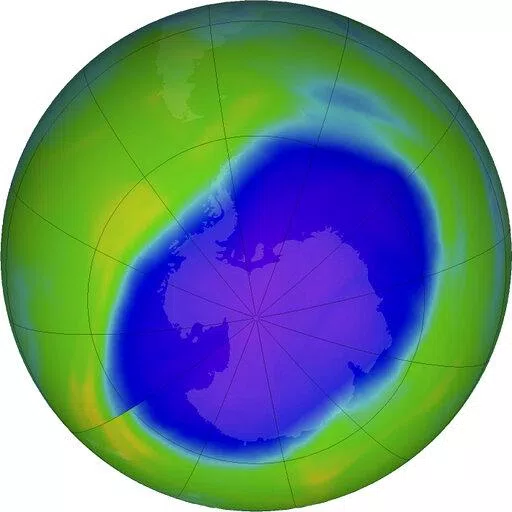In this NASA false-color image, the blue and purple shows the hole in Earth's protective ozone layer over Antarctica on Oct. 5, 2022. Earth’s protective ozone layer is slowly but noticeably healing at a pace that would fully mend the hole over Antarctica in about 43 years, a new United Nations report says. (NASA via AP, File)