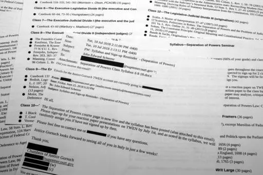 An email from July 10, 2018, with the syllabus about Supreme Court Justice Neil Gorsuch teaching an upcoming law class in Italy is photographed, July 10, 2023. An Associated Press examination of the ethics practices of the U.S. Supreme Court relied on documents obtained from more than 100 public records requests to public colleges, universities and other institutions that have hosted the justices over the past decade. (AP Photo/Jon Elswick, File)