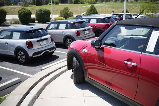 Used models are shown a Mini dealership on July 21, 2023, in Highlands Ranch, Colo. The average used car price is up 16% from three years ago. (AP Photo/David Zalubowski, File)