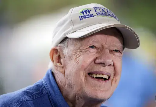 Former President Jimmy Carter answers questions during a news conference at a Habitat for Humanity building site, in Memphis, Tenn., on Nov. 2, 2015. (AP Photo/Mark Humphrey, File)