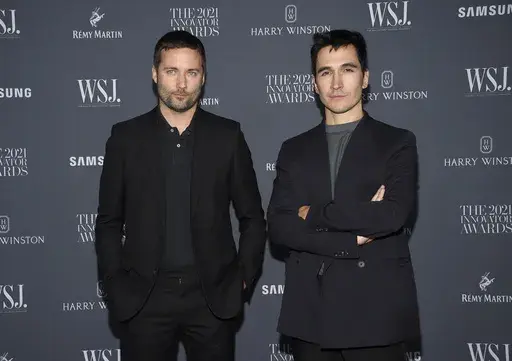 Fashion designers Jack McCollough, left, and Lazaro Hernandez attend the WSJ. Magazine Innovator Awards at the Museum of Modern Art, Nov. 1, 2021, in New York. (Photo by Evan Agostini/Invision/AP, File)