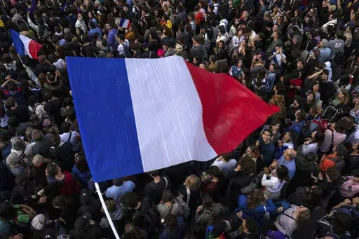 People gather at Republique plaza in a protest against the far-right, Wednesday, July 3, 2024, in Paris. France has one of Europe’s most diverse populations thanks to centuries of conquest and, in the last 200 years, immigration from Italy, Spain, eastern Europe, and France’s former colonies overseas. (AP Photo/Louise Delmotte, File)