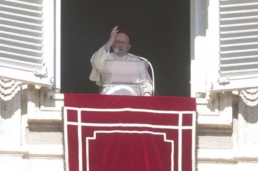 Pope Francis blesses the faithful from his studio's window overlooking St. Peter's Square on the occasion of the Angelus noon prayer at the Vatican, Sunday, Oct. 16, 2022.(AP Photo/Gregorio Borgia)