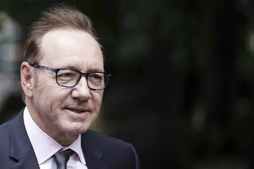 Actor Kevin Spacey arrives at Southwark Crown Court where he is accused of sexual offenses against four men in Britain, in London, Wednesday, July 5, 2023. The actor, charged under his full name of Kevin Spacey Fowler, has pleaded not guilty to all 12 counts, which relate to alleged incidents between 2001 and 2013. (Jordan Pettitt/PA via AP)