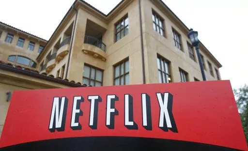 This photo shows the company logo and view of Netflix headquarters in Los Gatos, Calif., Jan. 29, 2010. Netflix shed almost 1 million subscribers during the spring amid tougher competition and soaring inflation that’s squeezing household budgets, heightening the urgency behind the video streaming service’s effort to launch a cheaper option with commercial interruptions. The April-June contraction of 970,000 accounts, announced Tuesday, July 19, 2022, as part of Netflix’s second-quarter ear