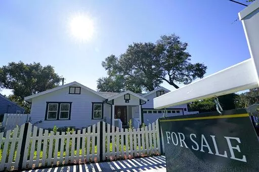A home for sale is seen on Dec. 8, 2020, in Orlando, Fla. Sales of previously occupied U.S. homes fell in September 2022 for the eighth month in a row, matching the pre-pandemic sales pace from 10 years ago, as house hunters faced sharply higher mortgage rates, higher home prices and a still tight supply of properties on the market. (AP Photo/John Raoux, File)