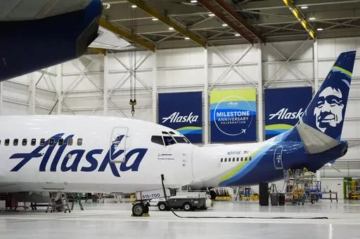 Alaska Airlines aircraft sit in the airline's hangar at Seattle-Tacoma International Airport Wednesday, Jan. 10, 2024, in SeaTac, Wash. Boeing has acknowledged in a letter to Congress that it cannot find records for work done on a door panel that blew out on an Alaska Airlines flight over Oregon two months ago. Ziad Ojakli, Boeing executive vice president and chief government lobbyist, wrote to Sen. Maria Cantwell on Friday, March 8 saying, “We have looked extensively and have not found any su