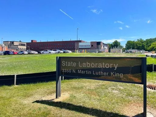 This July 2022 photo shows a lab in Lansing, Mich., where the state health department tests blood from newborns for more than 50 rare diseases. The state has agreed to destroy more than 3 million dried blood spots that are in storage. It's a partial settlement in an ongoing lawsuit over privacy, consent and the use of blood spots for research. The agreement doesn't cover millions more spots that are stored in Detroit.(Joey Cappelletti/Report for America via AP)