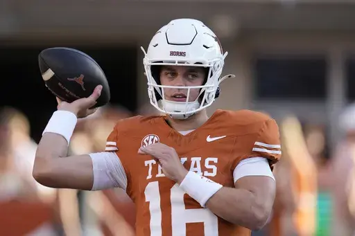 Texas quarterback Arch Manning throws before an NCAA college football game against Louisiana-Monroe in Austin, Texas, Saturday, Sept. 21, 2024. (AP Photo/Eric Gay)