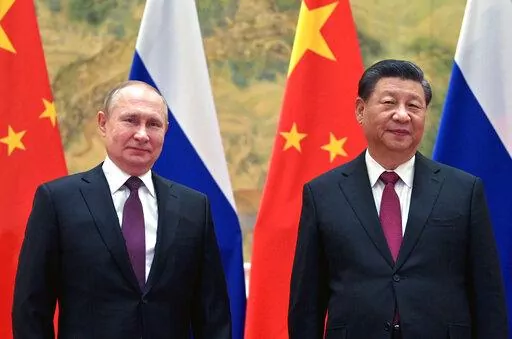 Chinese President Xi Jinping, right, and Russian President Vladimir Putin pose for a photo prior to their talks in Beijing, China, Feb. 4, 2022. One year into Russia's war against Ukraine, China is offering a 12-point proposal to end the fighting. (Alexei Druzhinin, Sputnik, Kremlin Pool Photo via AP, File)