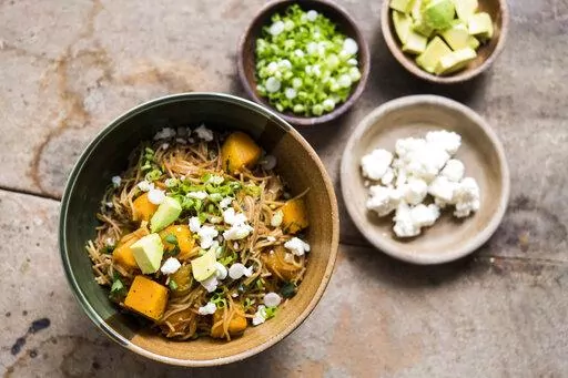 This image released by Milk Street shows a recipe for sopa seca w/butternut squash . (Milk Street via AP)
