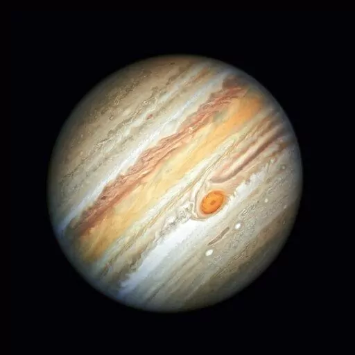 This photo made available by NASA shows the planet Jupiter, captured by the Hubble Space Telescope, on June 27, 2019. On Friday, Feb. 3, 2023, scientists said they have discovered 12 new moons around the gas giant, putting the total count at a record-breaking 92. That's more than any other planet in our solar system. (NASA, ESA, A. Simon/Goddard Space Flight Center, M.H. Wong/University of California, Berkeley via AP)