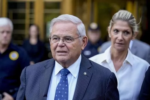 Sen. Bob Menendez and his wife, Nadine Menendez, leave federal court on Wednesday, Sept. 27, 2023, in New York. Federal prosecutors in New York City have rewritten their indictment against U.S. Sen Bob Menendez of New Jersey and his wife to charge them with conspiring to have him act as an agent of Egypt and Egyptian officials. The superseding indictment was filed in Manhattan federal court on Thursday, Oct. 12. (AP Photo/Seth Wenig, File)