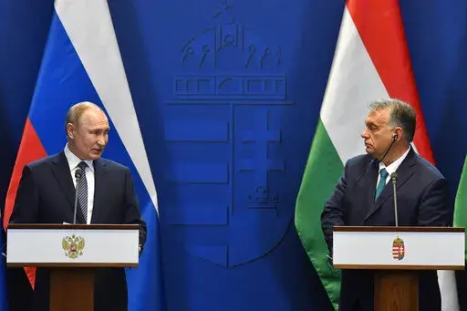 Hungarian Prime Minister Viktor Orban, right, and Russian President Vladimir Putin hold a joint press conference following their talks at the PM's office in the Castle of Buda in Budapest, Hungary, Wednesday, Oct. 30, 2019. Hungarian Prime Minister Viktor Orban has sought to assert Hungary’s neutrality in the war in Ukraine, even as his allies in the European Union and NATO move to assist the embattled country. Widely seen as Russian President Vladimir Putin’s closest ally in the EU, Orban h