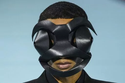 A model wears a creation for the Louis Vuitton fall-winter 22/23 men's collection, in Paris, Thursday, Jan. 20, 2022. (AP Photo/Francois Mori)