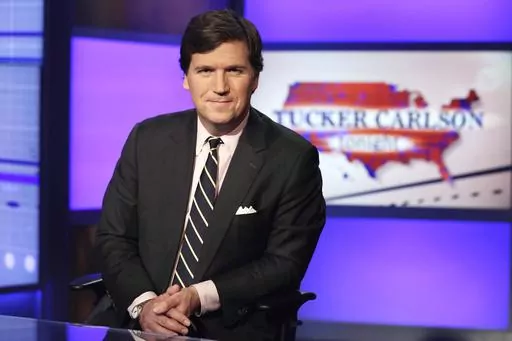 Tucker Carlson, host of "Tucker Carlson Tonight," poses for photos in a Fox News Channel studio on March 2, 2017, in New York. Fox News sent Carlson a “cease-and-desist” letter over his new Twitter series, Axios reported Monday, June 12, 2023, amid reports of contract battles between the conservative network and its former prime-time host. (AP Photo/Richard Drew, File)