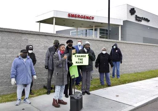 Missouri state Rep. Rasheen Aldridge leads a media event and rally outside the new Homer G. Phillips Memorial medical facility on Jefferson and Cass avenues, Saturday, Nov. 13, 2021, in St. Louis. The original five-story, 600-bed Homer G. Phillips Hospital in the Ville neighborhood was shuttered in 1979. But some people see the new name as an affront to the original, which is a recognized historic landmark. (Hillary Levin/St. Louis Post-Dispatch via AP)