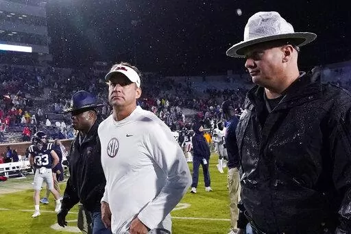 Mississippi coach Lane Kiffin leaves the field following the team's 24-22 loss to Mississippi State in an NCAA college football game in Oxford, Miss., Thursday, Nov. 24, 2022. (AP Photo/Rogelio V. Solis)