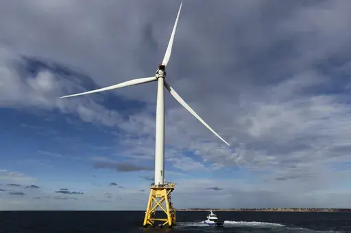 A Block Island Wind Farm turbine operates, Dec. 7, 2023, off the coast of Block Island, R.I., during a tour organized by Orsted. (AP Photo/Julia Nikhinson, File)