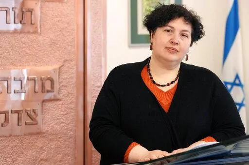 Rabbi Julia Gris, who led a Progressive Jewish congregation in Odessa, Ukraine, visits a synagogue in Warsaw, Poland, Saturday, March 12, 2022. Many Jews are among the more than 2.5 million refugees leaving Ukraine. International Jewish organizations have mobilized to help, working with local Jewish communities in Poland, Romania, Moldova and elsewhere to organize food, shelter, medical care and other assistance. Among them is Rabbi Gris, Ukraine's only woman rabbi, who these days leads online S