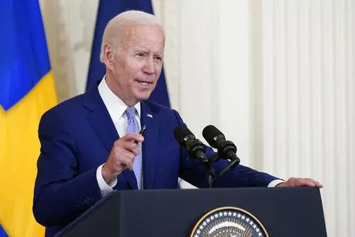 President Joe Biden speaks in the East Room of the White House in Washington, Tuesday, Aug. 9, 2022. Climate activists are clamoring for President Joe Biden to declare a national climate emergency, calls the White House has so far not headed. (AP Photo/Susan Walsh, File)