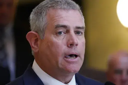 Speaker Philip Gunn, R-Clinton, presents to reporters the House's position on their state income tax elimination legislation at the Mississippi Capitol in Jackson, Tuesday, March 15, 2022. (AP Photo/Rogelio V. Solis)