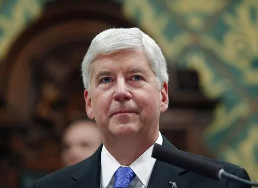 Then-Michigan Gov. Rick Snyder delivers his State of the State address at the state Capitol in Lansing, Mich., Jan. 23, 2018. Lawyers for former governor Snyder urged a judge Tuesday, Oct. 11, 2022, to dismiss misdemeanor charges related to the Flint water crisis, a week after another judge took that step with seven other former officials. (AP Photo/Al Goldis, File)