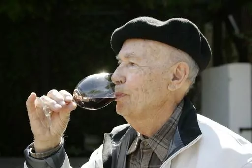 Winemaker Mike Grgich sips a glass of his Cabernet Sauvignon wine at the Grgich Hills Estate winery in Rutherford, Calif., on Sept. 15, 2008. Grgich, a celebrated winemaker who helped establish Napa Valley as one of the world’s premier wine-making regions, has died. He was 100. (AP Photo/Eric Risberg, File)