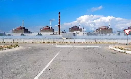 In this handout photo taken from video and released by Russian Defense Ministry Press Service on Aug. 7, 2022, a general view of the Zaporizhzhia Nuclear Power Station in territory under Russian military control, southeastern Ukraine. The Zaporizhzhia plant is in southern Ukraine, near the town of Enerhodar on the banks of the Dnieper River. It is one of the 10 biggest nuclear plants in the world. Russia and Ukraine have accused each other of shelling Europe's largest nuclear power plant, stokin