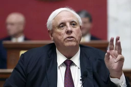 West Virginia Gov. Jim Justice speaks in the House Chambers at the state capitol in Charleston, W.Va., on Jan. 11, 2023. Gov. Justice on Wednesday, March 29, 2023, signed a bill banning gender-affirming care for minors, joining at least 10 other states that have enacted laws restricting or outlawing medically supported treatments for transgender youth. (AP Photo/Chris Jackson, File)