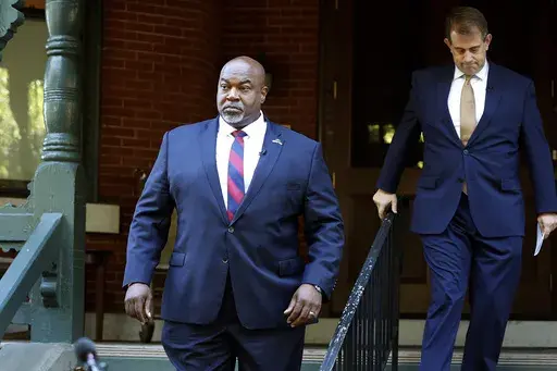 North Carolina Lt. Gov. Mark Robinson arrives at a news conference in Raleigh, N.C., Tuesday, Oct. 15, 2024. (AP Photo/Karl B DeBlaker)