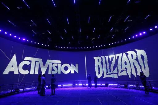 The Activision Blizzard Booth during the Electronic Entertainment Expo in Los Angeles, June 13, 2013. The Federal Trade Commission said Thursday, Dec. 8, 2022, that it is suing to block Microsoft’s planned $69 billion takeover of video game company Activision Blizzard, saying it could suppress competitors to its Xbox game consoles and its growing games subscription business. (AP Photo/Jae C. Hong, File)