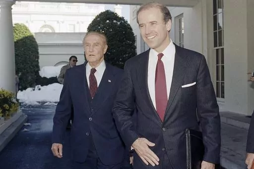 Chairman of the Senate Judiciary Committee, Joe Biden (D-Del.), right, and the former chairman of the panel, Sen. Strom Thurmond (R-S.C.), depart the West Wing of White House in Washington, Nov. 12, 1987, after meeting with President Reagan. On Sept. 1, 2023, The Associated Press reported on President Biden’s inaccurate claim that he “literally” convinced Thurmond, a segregationist, to vote in favor of the Civil Rights Act. (AP Photo/Ira Schwarz, File)