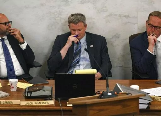 Attorney General Jason Ravnsborg reacts to the successful vote to impeach and remove him from office on Tuesday, June 21, 2022, at the South Dakota State Capitol in Pierre, S.D. The South Dakota Senate on Tuesday convicted Ravnsborg of two impeachment charges stemming from a 2020 car crash in which he killed a pedestrian, immediately removing him and barring him from serving in public office again. (Erin Woodiel/The Argus Leader via AP)