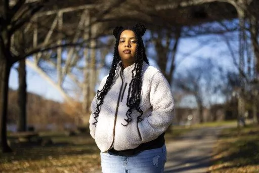 High school student Mecca Patterson-Guridy, 17, poses for a portrait in Philadelphia, Friday, Dec. 9, 2022. Scrutiny from conservatives around teaching about race, gender and sexuality has made many teachers reluctant to discuss issues that touch on cultural divides. To fill in gaps, some students, including Mecca, are looking to social media, where online personalities, nonprofit organizations and teachers are experimenting with ways to connect with them outside the confines of school. (AP Phot