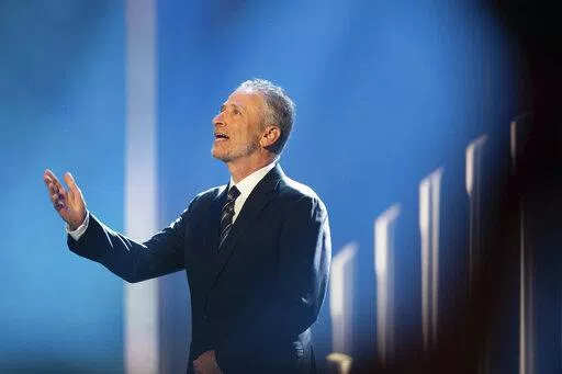 Mark Twain Prize recipient Jon Stewart is introduced at the start of the 23rd annual Mark Twain Prize for American Humor at the Kennedy Center for the Performing Arts on Sunday, April 24, 2022, in Washington. (AP Photo/Kevin Wolf)