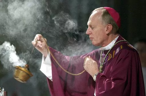 Bishop Howard Hubbard swings incense during an Ash Wednesday communion service at the Cathedral of the Immaculate Conception on Feb. 25, 2004, in Albany, N.Y. Hubbard, now retired and who has admitted to covering up for predator priests and has himself been accused of sexual abuse, has asked Pope Francis to laicize him, or remove him from the priesthood. Hubbard, 84, announced the decision in a statement Friday, Nov. 18, 2022, the day the United Nations has designated as the World Day for Previo