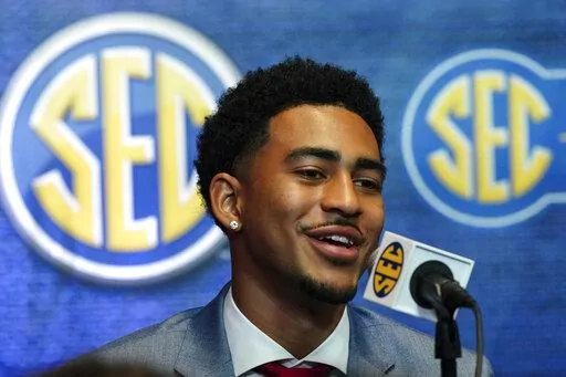 Alabama quarterback Bryce Young speaks during NCAA college football Southeastern Conference Media Days Tuesday, July 19, 2022, in Atlanta. (AP Photo/John Bazemore)